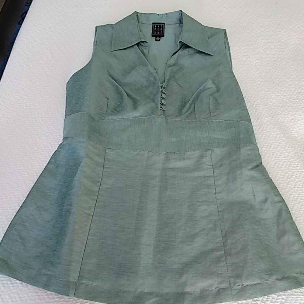 Light aqua sleeveless blouse